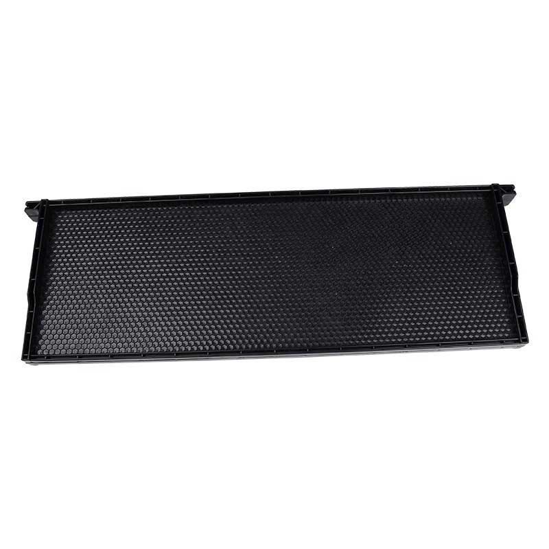 black plastic frame with comb foundation